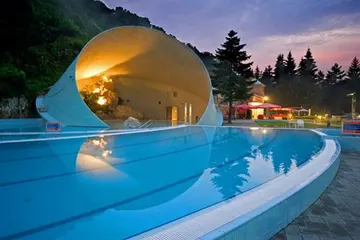 The shell and the pool at dusk